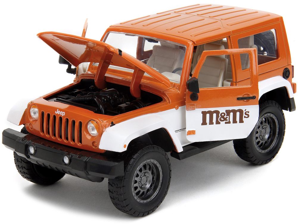 2007 Jeep Wrangler Orange Metallic and White and Orange M&M Diecast Figure "M&M's" "Hollywood Rides" Series 1/24 Diecast Model Car by Jada view 2
