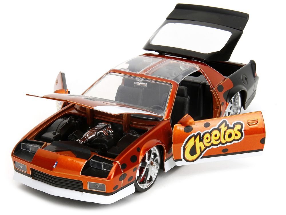1985 Chevrolet Camaro Z/28 Orange Metallic with Graphics and Chester Cheetah Diecast Figure "Cheetos" "Hollywood Rides" Series 1/24 Diecast Model Car by Jada view 2