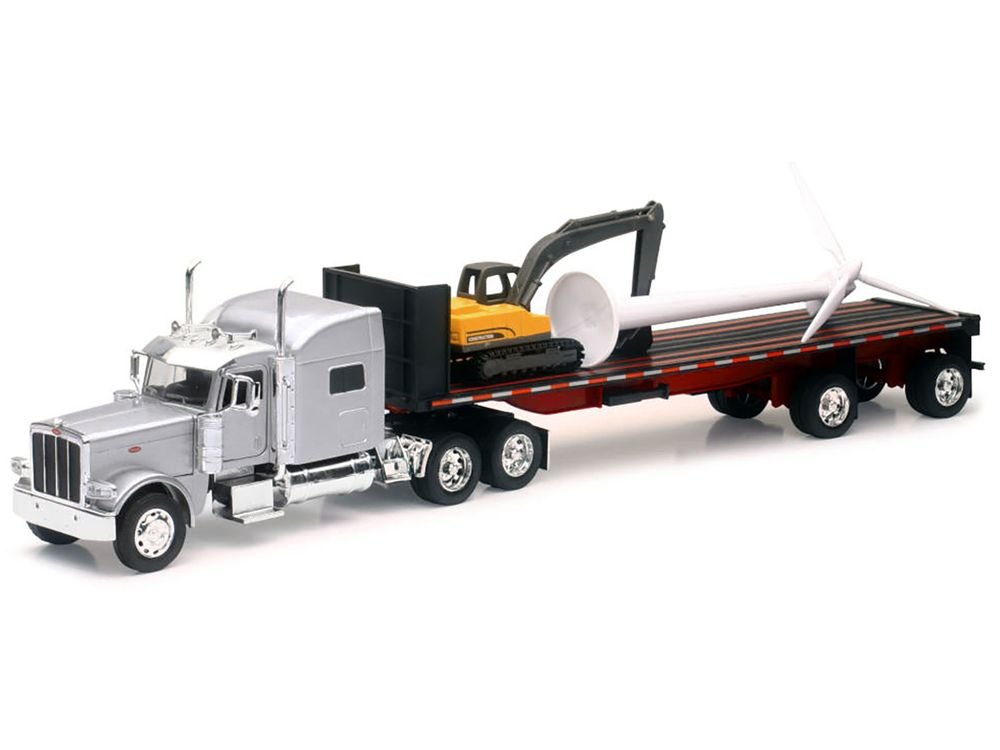 Peterbilt 389 Truck with Flatbed Trailer Silver Metallic with Excavator and Wind Turbine "Long Haul Truckers" Series 1/32 Diecast Model by New Ray view 2