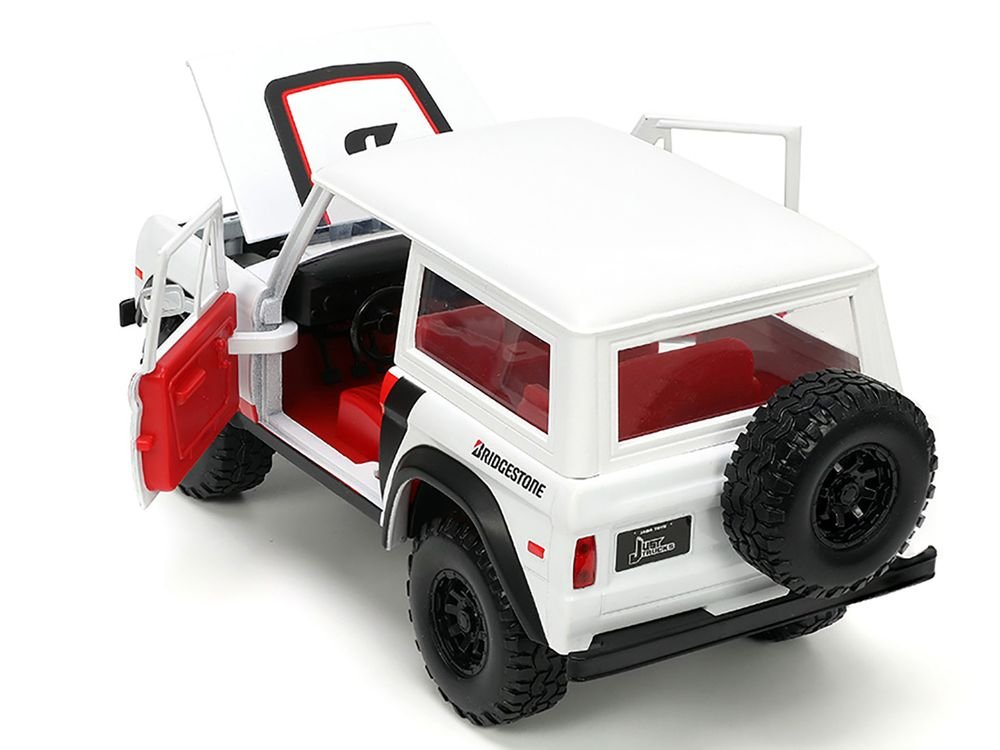 1973 Ford Bronco #008 White with Red and Black Stripes and Red Interior with Extra Wheels "Just Trucks" Series 1/24 Diecast Model Car by Jada view 4