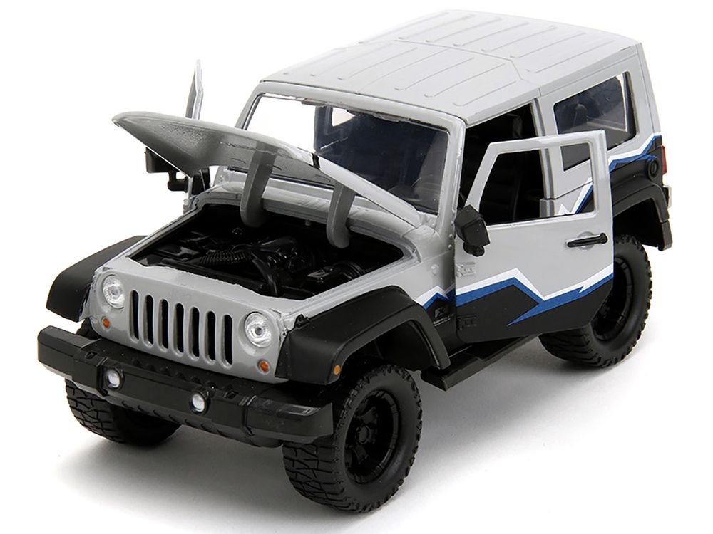 2007 Jeep Wrangler Gray and Black with Blue and White Stripes with Extra Wheels "Just Trucks" Series 1/24 Diecast Model Car by Jada view 2