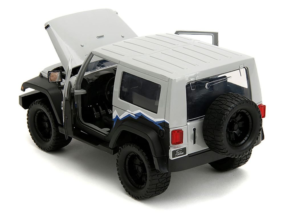 2007 Jeep Wrangler Gray and Black with Blue and White Stripes with Extra Wheels "Just Trucks" Series 1/24 Diecast Model Car by Jada view 4
