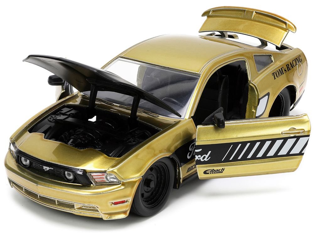 2010 Ford Mustang GT Gold Metallic with Black Graphics and Hood "Tom's Racing" "Bigtime Muscle" Series 1/24 Diecast Model Car by Jada view 2