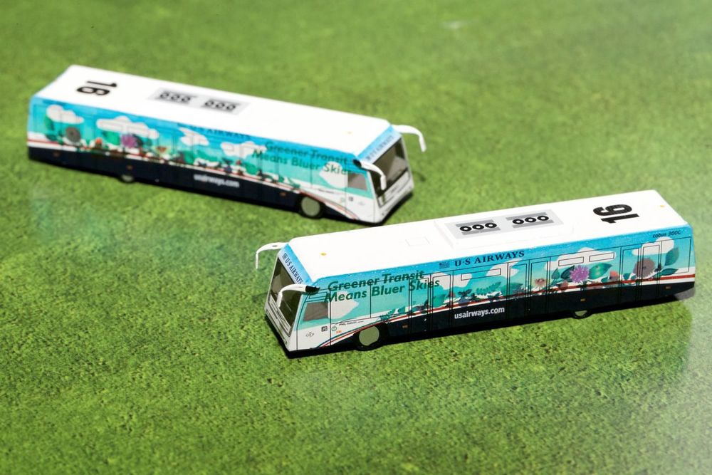Cobus 3000 Passenger Bus White and Blue with Graphics "US Airways Shuttle Bus - Greener Transit" 2 Piece Set "Gemini 200" Series Diecast Models by GeminiJets view 2