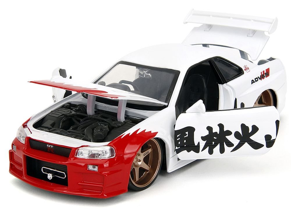 2002 Nissan Skyline GT-R (R34) RHD (Right Hand Drive) White with Red Graphics and Ryu Diecast Figure "Street Fighter" Video Game "Anime Hollywood Rides" Series 1/24 Diecast Model Car by Jada view 2