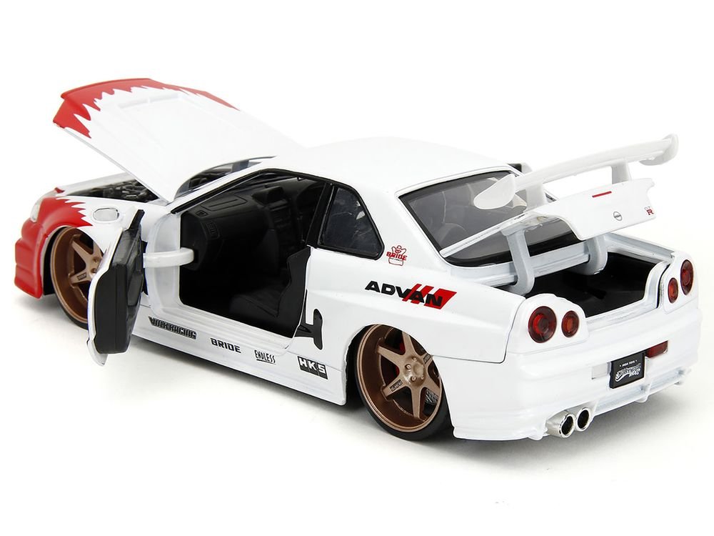 2002 Nissan Skyline GT-R (R34) RHD (Right Hand Drive) White with Red Graphics and Ryu Diecast Figure "Street Fighter" Video Game "Anime Hollywood Rides" Series 1/24 Diecast Model Car by Jada view 4