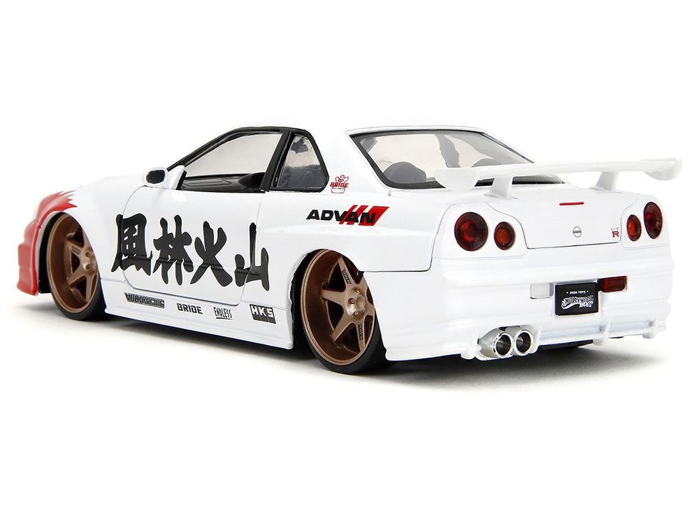2002 Nissan Skyline GT-R (R34) RHD (Right Hand Drive) White with Red Graphics and Ryu Diecast Figure "Street Fighter" Video Game "Anime Hollywood Rides" Series 1/24 Diecast Model Car by Jada view 5