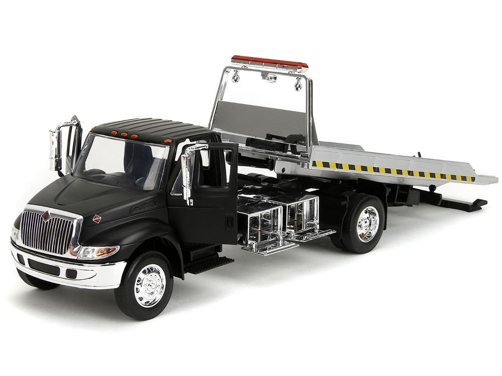International DuraStar 4400 Flatbed Tow Truck Matt Black 1/24 Diecast Model Car by Jada view 2