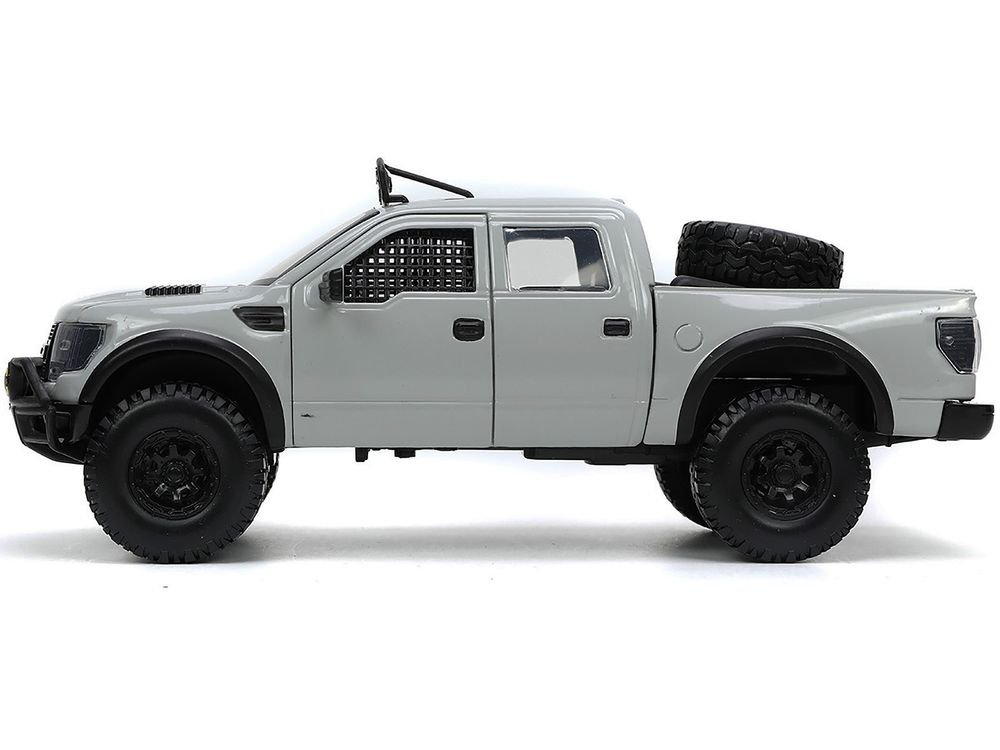 2011 Ford F-150 SVT Raptor Pickup Truck Light Gray with Extra Wheels "Just Trucks" Series 1/24 Diecast Model Car by Jada view 4