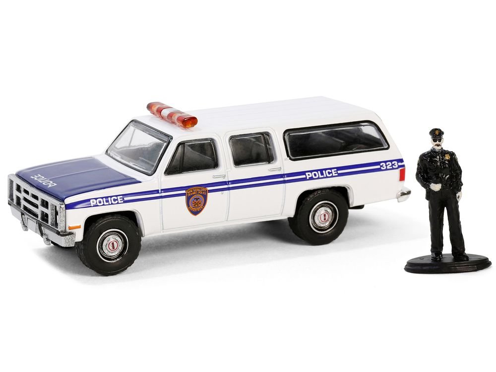 1985 GMC Suburban 2500 "New York City Transit Police Department" White with Blue Stripes and Police Officer Figure "The Hobby Shop" Series 16 1/64 Diecast Model Car by Greenlight view 2