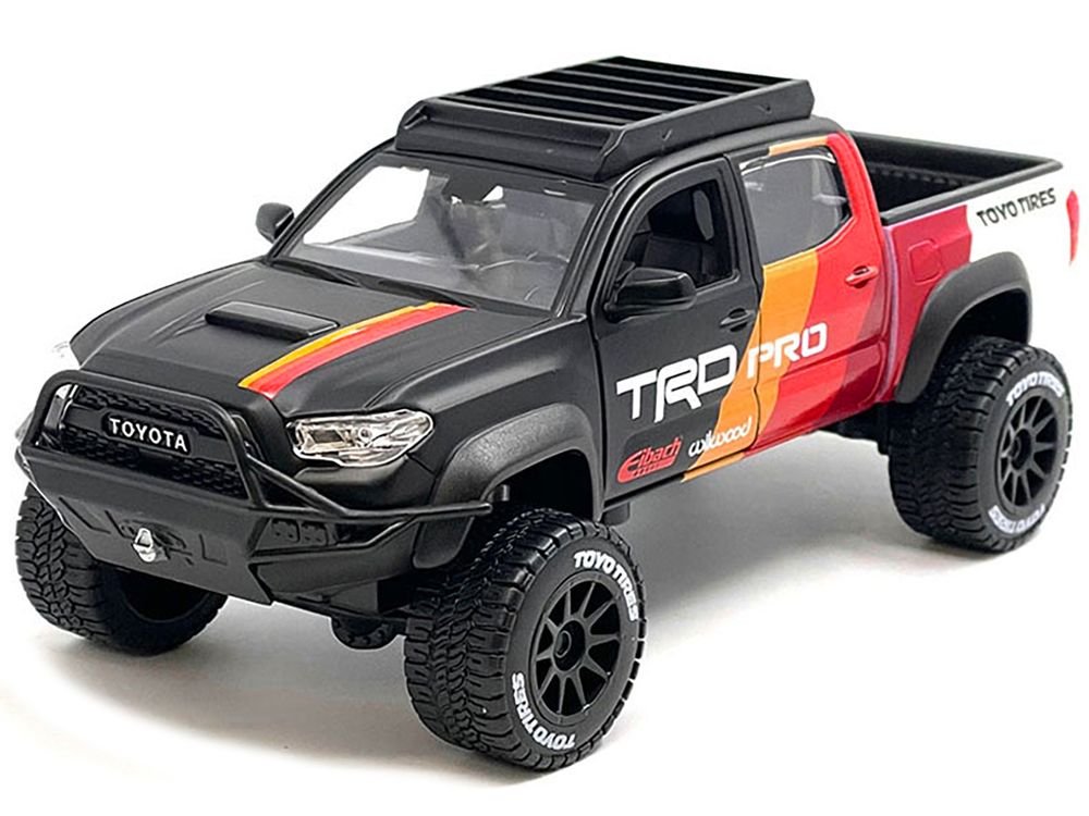 2023 Toyota Tacoma TRD PRO Off Road Pickup Truck Matt Black with Graphics and Roofrack "Maisto Design" Series 1/27 Diecast Model Car by Maisto view 2