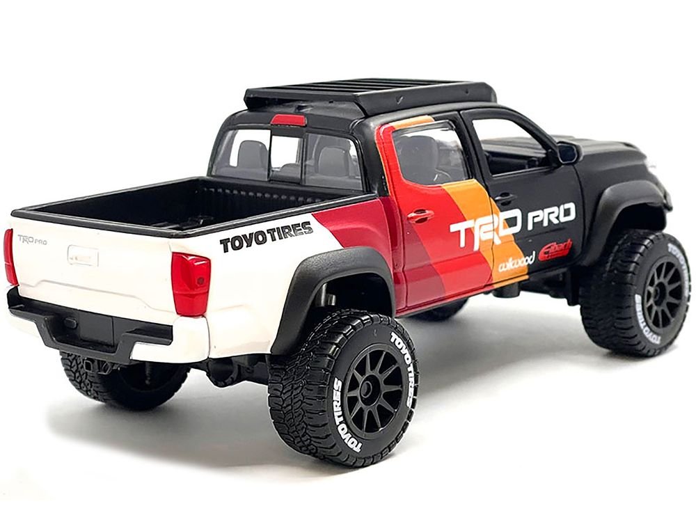 2023 Toyota Tacoma TRD PRO Off Road Pickup Truck Matt Black with Graphics and Roofrack "Maisto Design" Series 1/27 Diecast Model Car by Maisto view 3