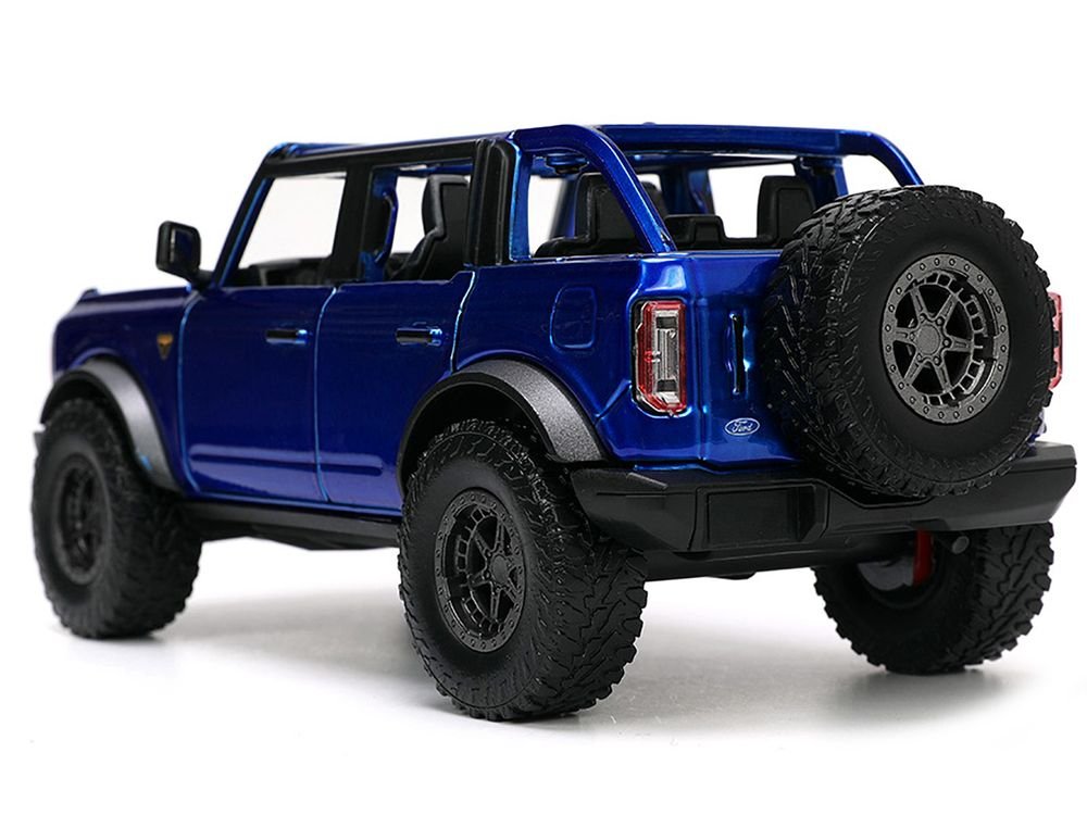 2021 Ford Bronco Open-Top Candy Blue Metallic with Extra Wheels "Just Trucks" Series 1/24 Diecast Model Car by Jada view 5