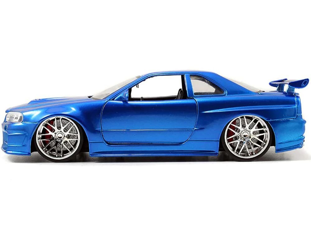 Brian's Nissan GTR Skyline R34 RHD (Right Hand Drive) Blue 25th Anniversary "Fast & Furious" Movie 1/24 Diecast Model Car by Jada view 2