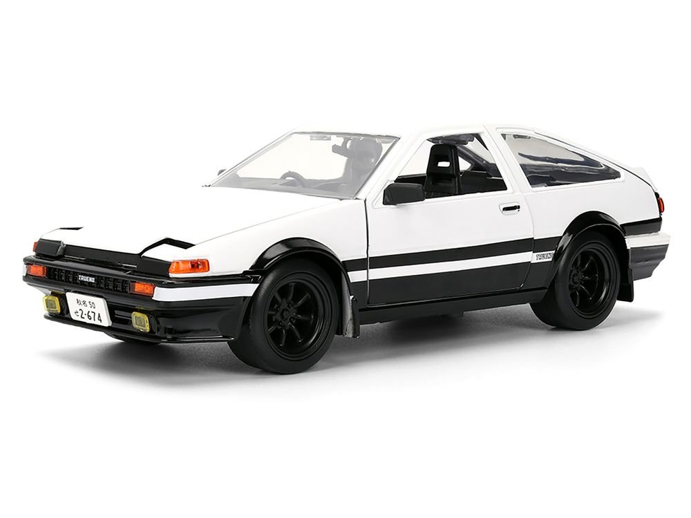 Toyota Trueno (AE86) RHD (Right Hand Drive) White and Black with Graphics and Takumi Diecast Figure "Initial D" (1998-2021) TV Series "Anime Hollywood Rides" Series 1/24 Diecast Model by Jada view 2