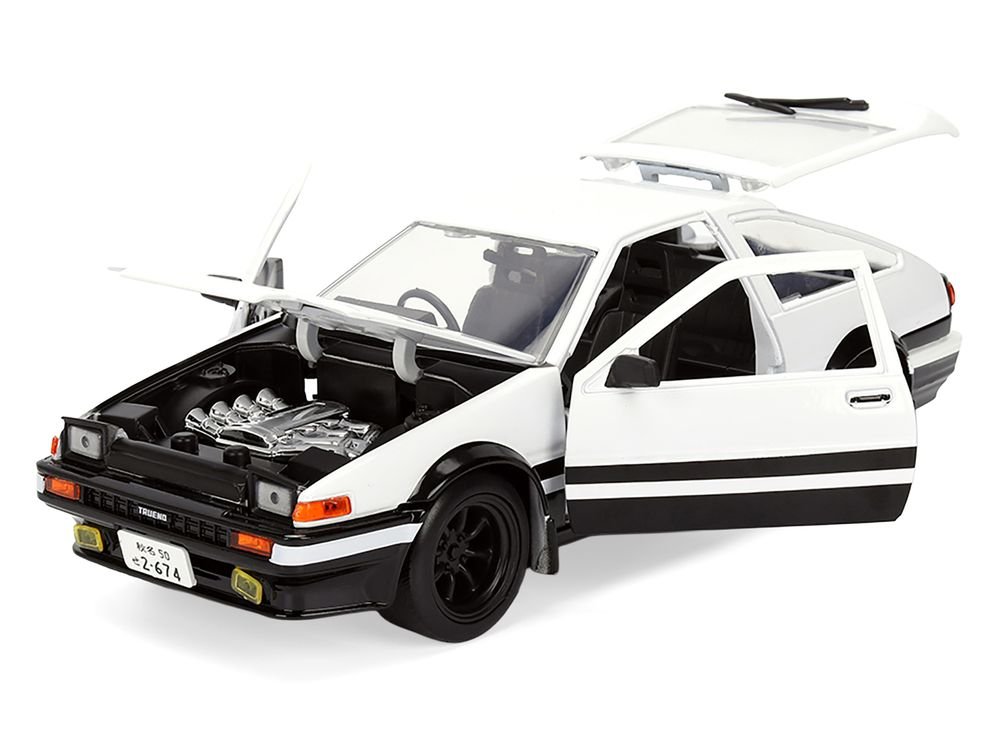 Toyota Trueno (AE86) RHD (Right Hand Drive) White and Black with Graphics and Takumi Diecast Figure "Initial D" (1998-2021) TV Series "Anime Hollywood Rides" Series 1/24 Diecast Model by Jada view 3