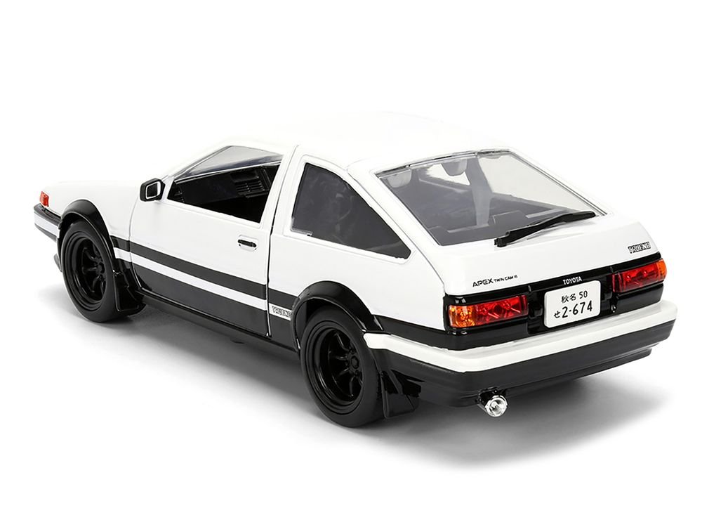 Toyota Trueno (AE86) RHD (Right Hand Drive) White and Black with Graphics and Takumi Diecast Figure "Initial D" (1998-2021) TV Series "Anime Hollywood Rides" Series 1/24 Diecast Model by Jada view 5