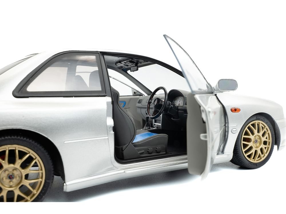 1998 Subaru Impreza 22B RHD (Right Hand Drive) Silver Metallic with Gold Wheels 1/18 Diecast Model Car by Solido view 3