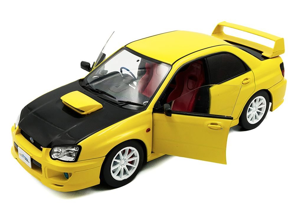 2003 Subaru Impreza WRX STI RHD (Right Hand Drive) Yellow with Carbon Hood 1/18 Diecast Model Car by Solido view 2