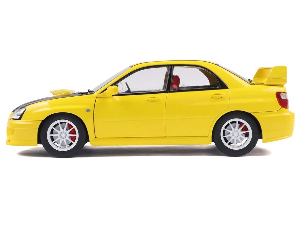 2003 Subaru Impreza WRX STI RHD (Right Hand Drive) Yellow with Carbon Hood 1/18 Diecast Model Car by Solido view 3