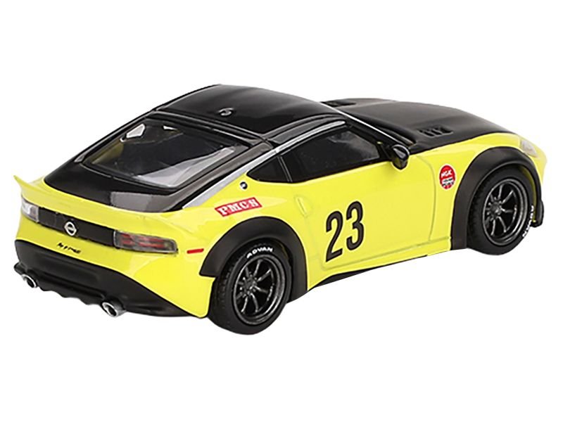 Nissan Z "LB-Nation Works" #23 Ikazuchi Yellow with Black Hood and Top Limited Edition 1/64 Diecast Model Car by Mini GT view 3