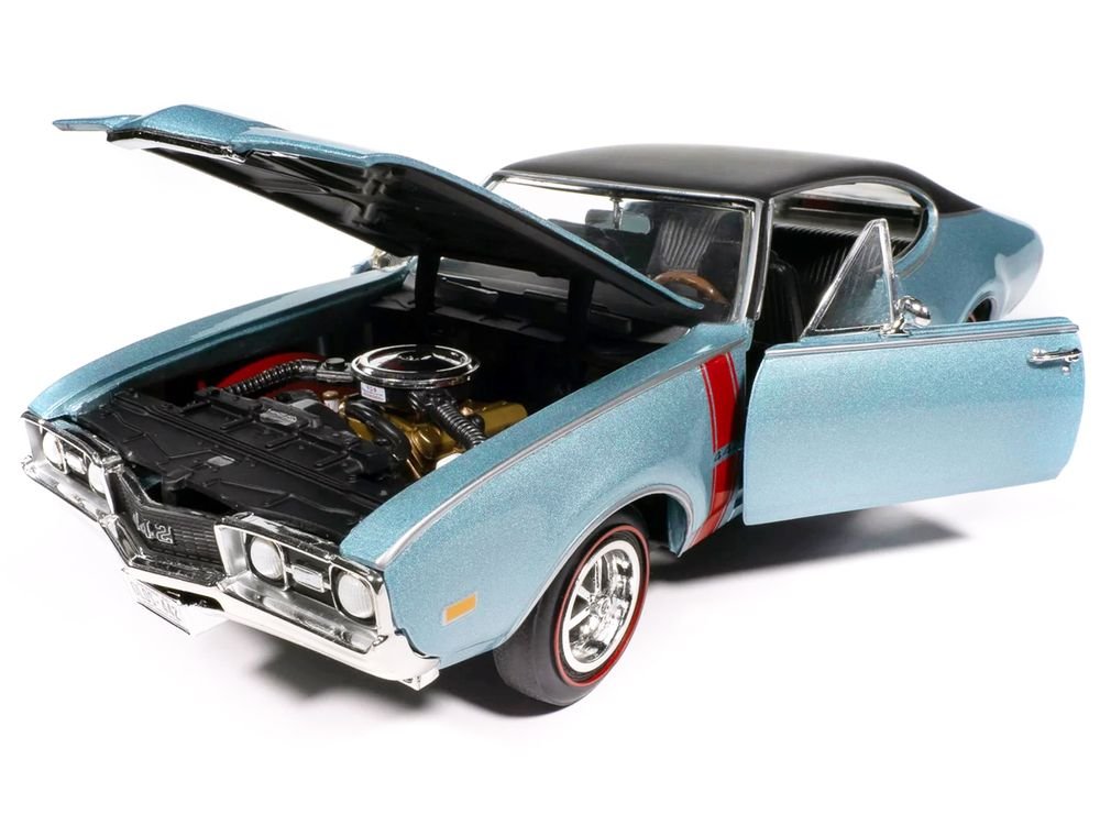 1968 Oldsmobile 442 W30 Holiday Coupe Teal Frost Metallic with Red Stripes and Black Vinyl Top "Hemmings Motor News July 2023 Cover Car" "American Muscle" Series 1/18 Diecast Model Car by Auto World view 2