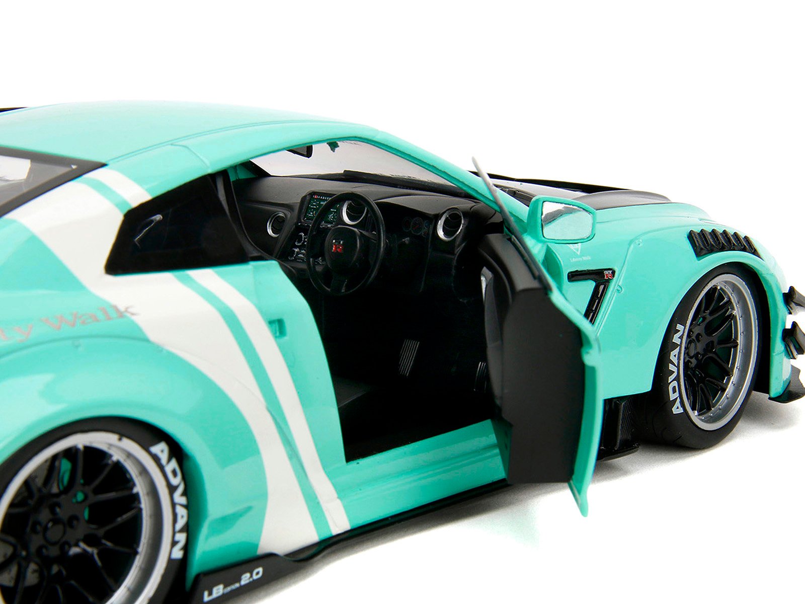 Nissan GT-R (R35) Liberty Walk Body Kit 2.0 RHD (Right Hand Drive) Light Blue with Black Hood and White Stripes "Pink Slips" Series 1/18 Diecast Model Car by Jada view 3