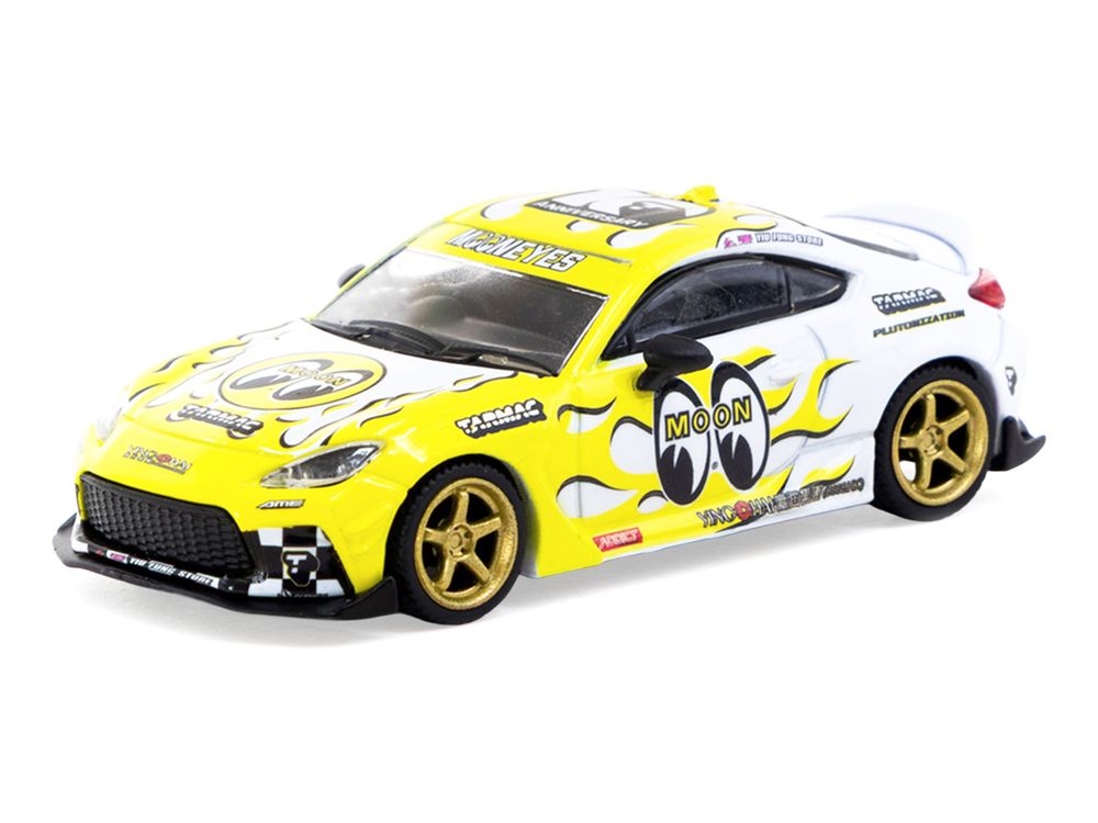 Toyota GR86 RHD (Right Hand Drive) "MoonEyes" White with Yellow Flames and Graphics "Global64" Series 1/64 Diecast Model by Tarmac Works view 2
