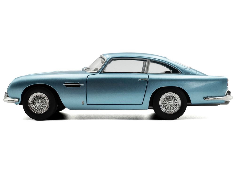 1964 Aston Martin DB5 RHD (Right Hand Drive) Light Blue Metallic 1/18 Diecast Model Car by Solido view 3