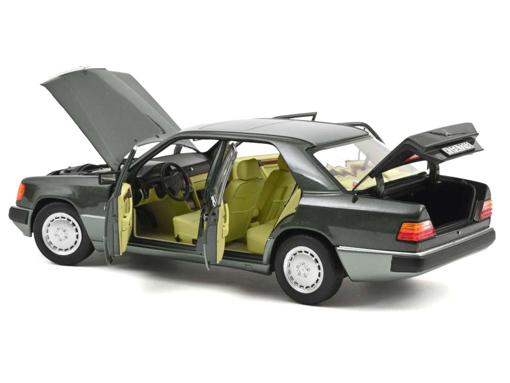 1990 Mercedes-Benz 230 E Night Green Metallic with Green Interior 1/18 Diecast Model Car by Norev view 2