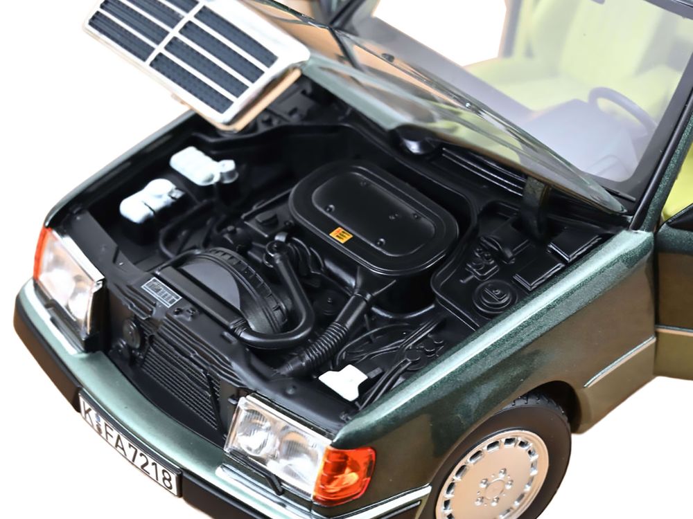 1990 Mercedes-Benz 230 E Night Green Metallic with Green Interior 1/18 Diecast Model Car by Norev view 3