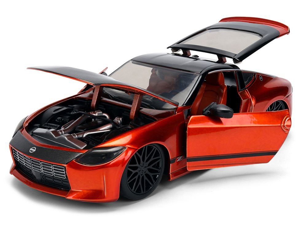 2023 Nissan Z Orange Metallic with Carbon Hood and Black Top "JDM Tuners" Series 1/24 Diecast Model Car by Jada view 2