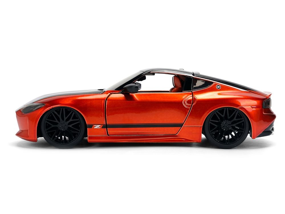2023 Nissan Z Orange Metallic with Carbon Hood and Black Top "JDM Tuners" Series 1/24 Diecast Model Car by Jada view 3