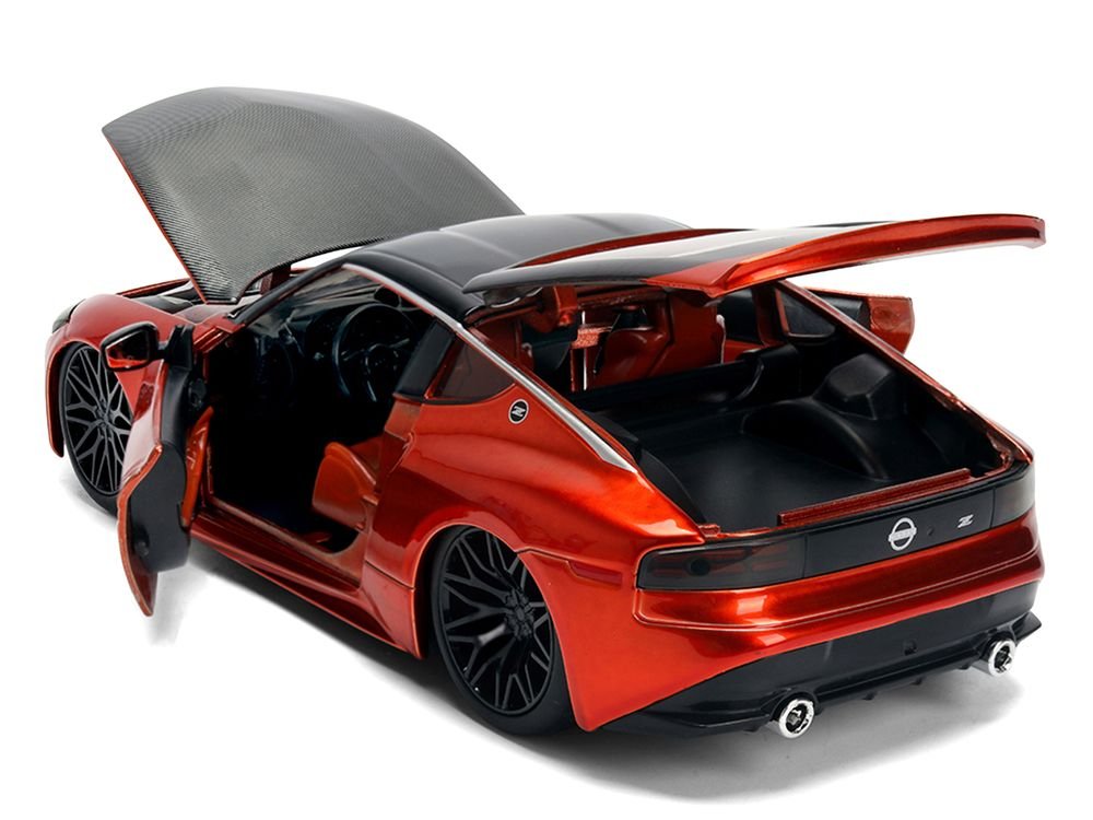2023 Nissan Z Orange Metallic with Carbon Hood and Black Top "JDM Tuners" Series 1/24 Diecast Model Car by Jada view 4