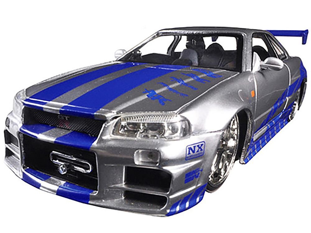 Brian's Nissan GTR Skyline R34 RHD (Right Hand Drive) Silver with Blue Stripes "Fast & Furious 25th Anniversary" 1/24 Diecast Model Car by Jada view 2
