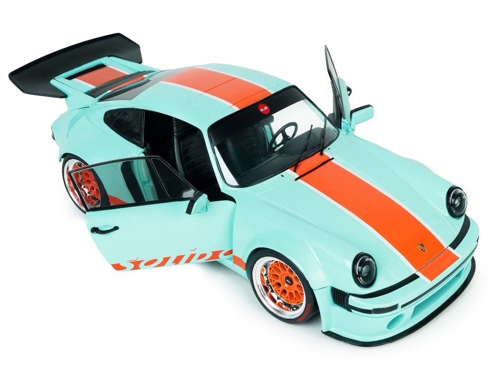 2025 Porsche 911 KS-R by Khyzyl Saleem "Blue Racer" Light Blue with Orange Stripes 1/18 Diecast Model Car by Solido view 2