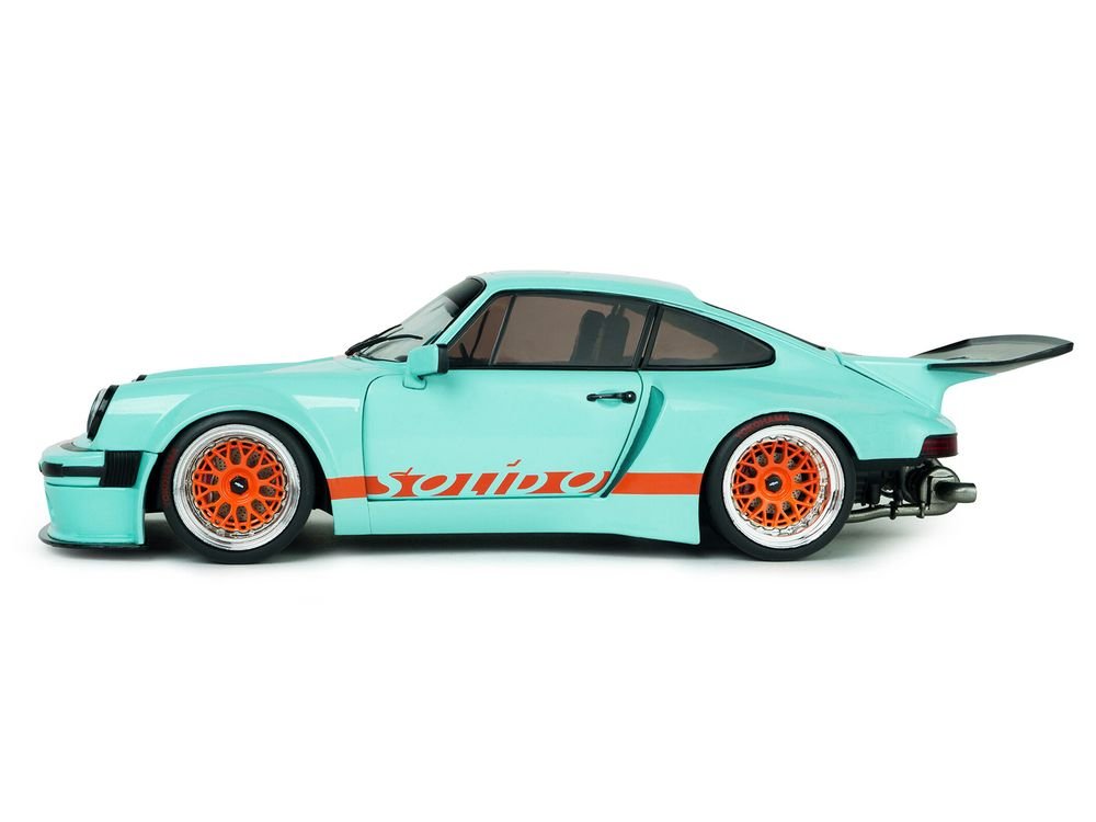 2025 Porsche 911 KS-R by Khyzyl Saleem "Blue Racer" Light Blue with Orange Stripes 1/18 Diecast Model Car by Solido view 3