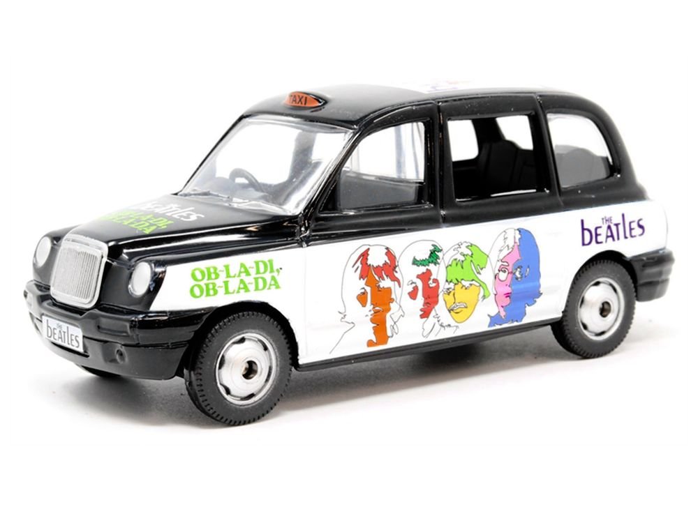 The Beatles London Taxi RHD (Right Hand Drive) "Ob-La-Di Ob-La-Da" Black and White with Graphics Diecast Model by Corgi view 2
