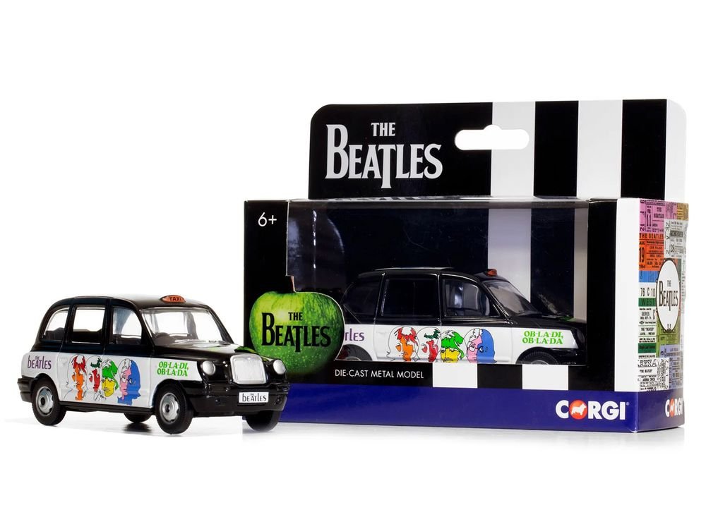 The Beatles London Taxi RHD (Right Hand Drive) "Ob-La-Di Ob-La-Da" Black and White with Graphics Diecast Model by Corgi view 3