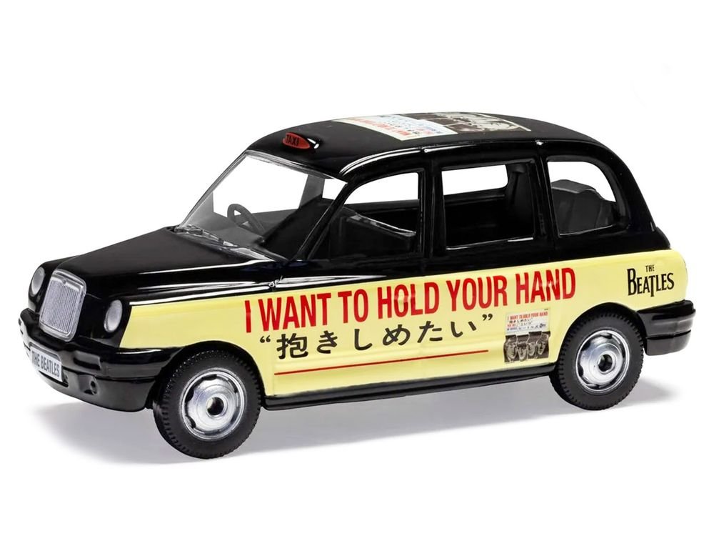 The Beatles London Taxi RHD (Right Hand Drive) "I Want To Hold Your Hand" Black and Cream with Graphics Diecast Model by Corgi view 2