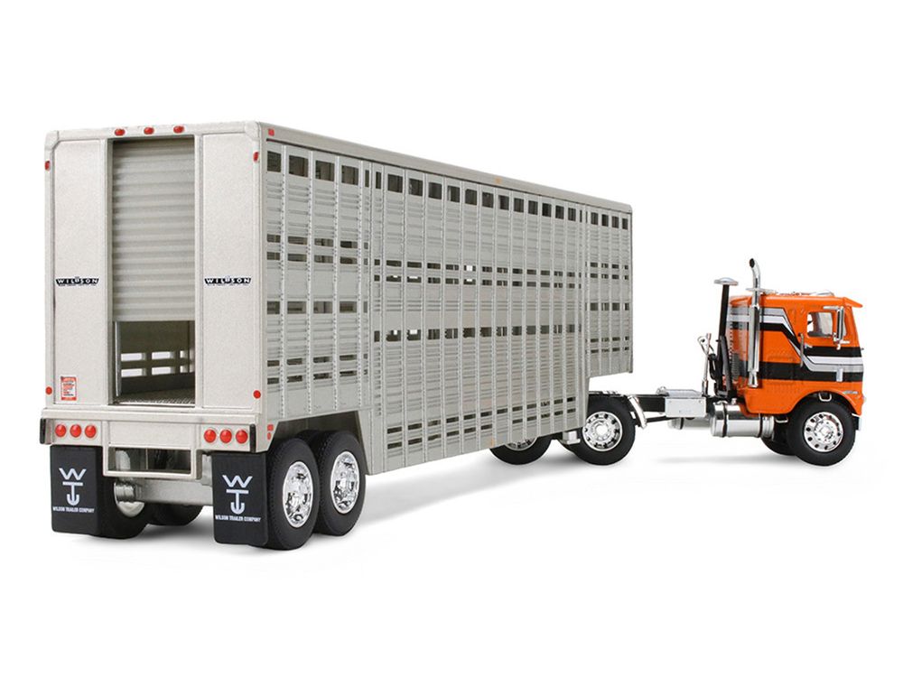 Freightliner COE and 45' Wilson Vintage Livestock Trailer Orange with Stripes 1/64 Diecast Model by DCP/First Gear view 4