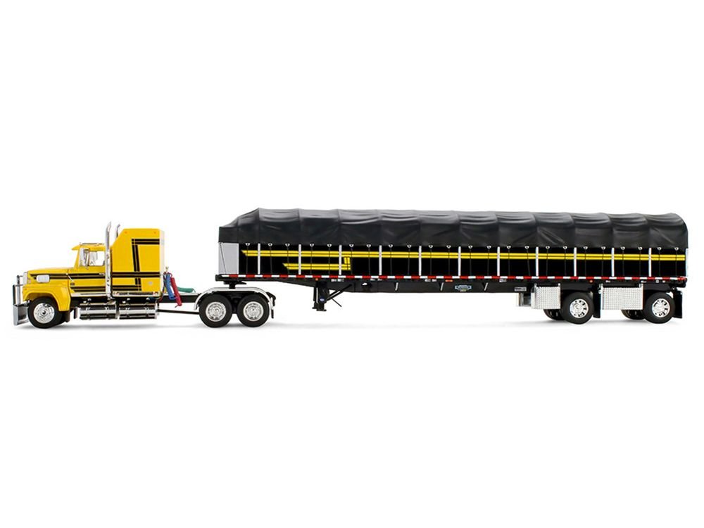Ford LTL 9000 with 60" Aerodyne Sleeper and 53' Wilson Roadbrute Flatbed Trailer with Covered Wagon Yellow with Black Stripes 1/64 Diecast Model by DCP/First Gear view 3