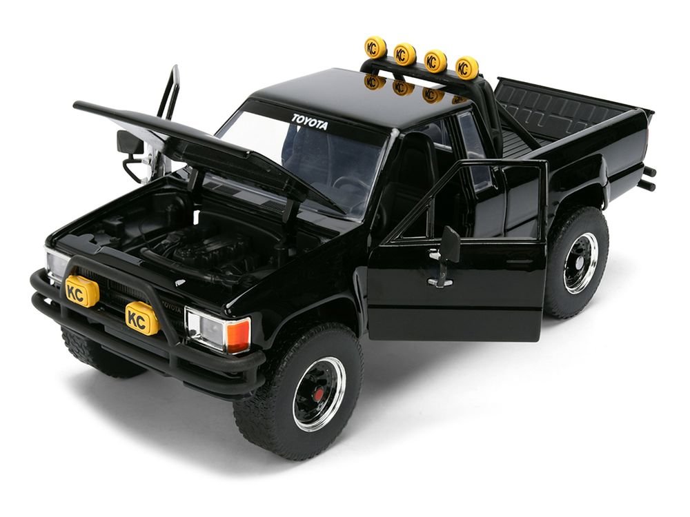 1985 Toyota SR5 Pickup Truck Black with Marty's Skateboard "Back to the Future" (1985) Movie "Hollywood Rides" Series 1/24 Diecast Model Car by Jada view 2