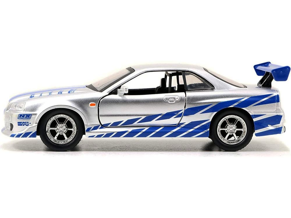 Brian's Nissan Skyline GT-R (R34) RHD (Right Hand Drive) Silver Metallic with Blue Stripes "2 Fast 2 Furious" (2003) Movie "Fast & Furious 25th Anniversary" Series 1/32 Diecast Car Model by Jada view 2