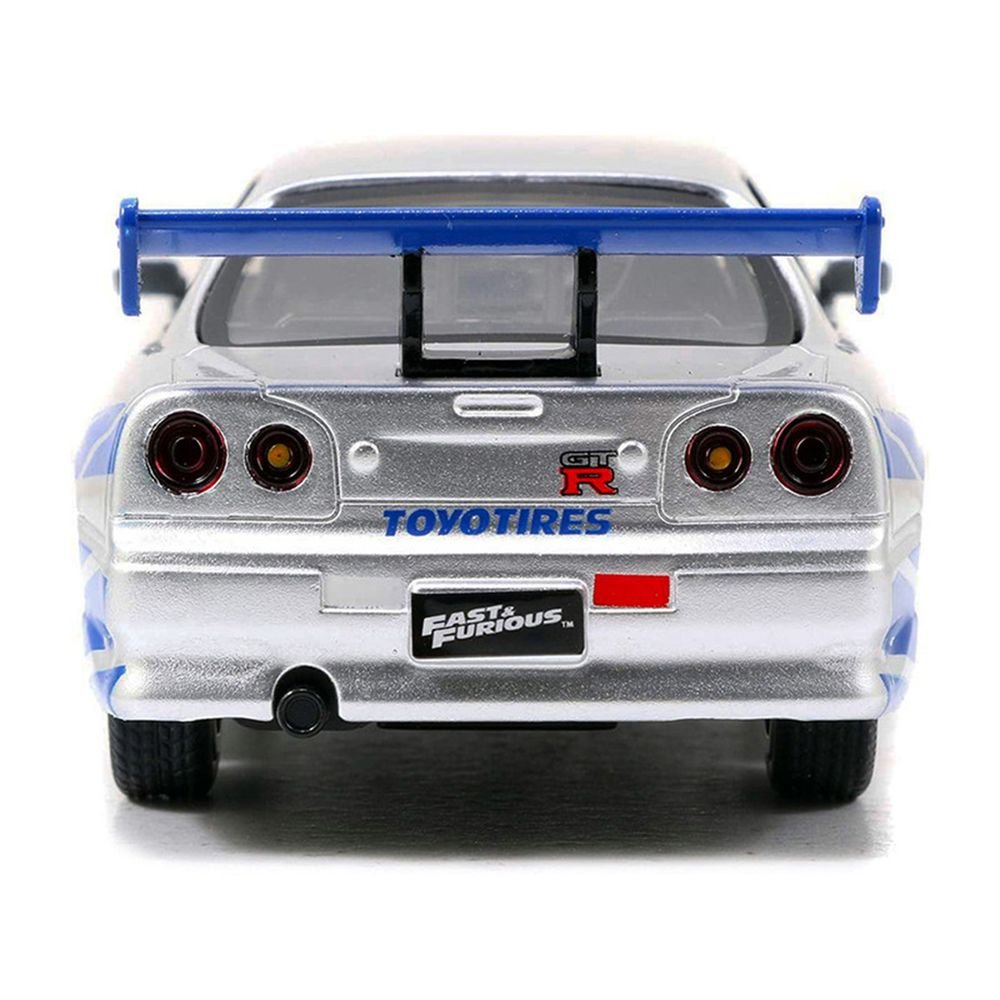 Brian's Nissan Skyline GT-R (R34) RHD (Right Hand Drive) Silver Metallic with Blue Stripes "2 Fast 2 Furious" (2003) Movie "Fast & Furious 25th Anniversary" Series 1/32 Diecast Car Model by Jada view 5