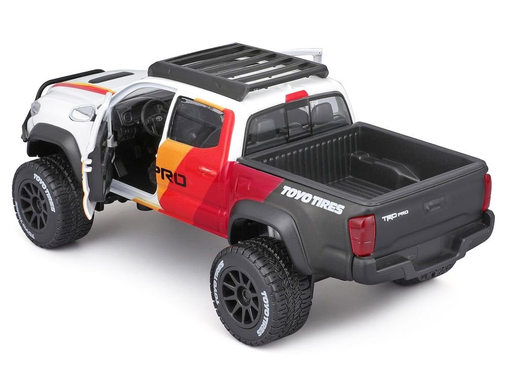 2023 Toyota Tacoma TRD PRO Off Road Pickup Truck White with Graphics and Roof Rack "Maisto Design" Series 1/27 Diecast Model Car Maisto view 3